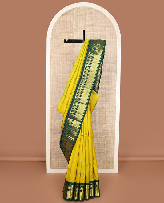 Green zari buttas Kanchipuram silk saree, contrast one-sided korvai border of kodi visiry, and jaal design, and human figurines motifs woven pallu