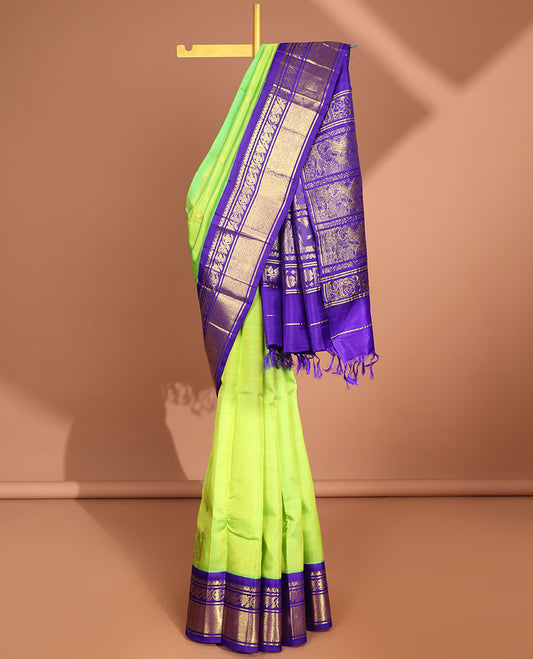 Green floral buttas kancheepuram silk saree with contrast intricate zari border & floral, human design pallu