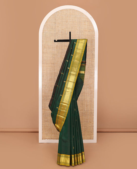 Green zari buttas Kanchipuram silk saree, contrast one-sided border of panner sombu,banaras,muthu & mayil kann & zari design pallu