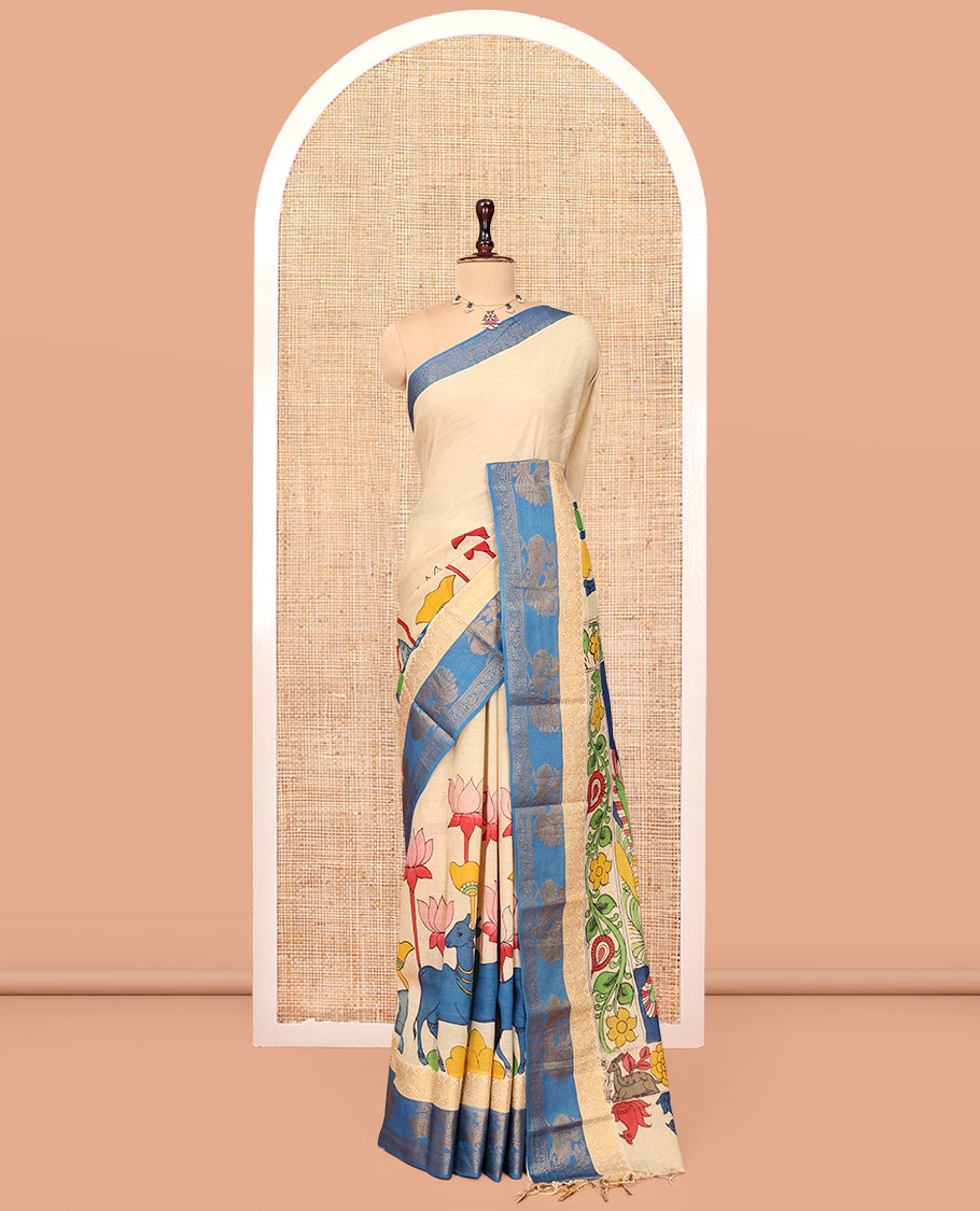 Sandal Kalamkari Printed Semi-Banarasi Tussar Saree, Beautified with Pichwai Cow-Lotus, Contrast Traditional Border, Contrast Peacock Printed Pallu, and a Contrast Blouse