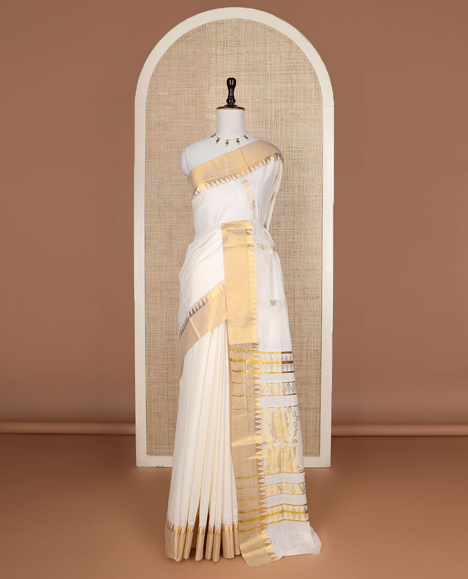 Cream zari design Kerala saree, zari temple border, and pallu features temple and floral designs