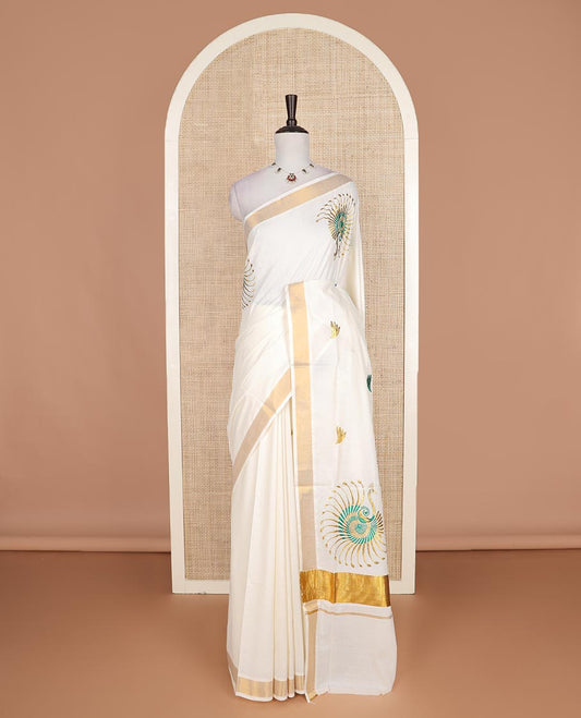 Cream peacock motifs embroidered Kerala cotton saree, bavanji border, and peacock embroidered pallu