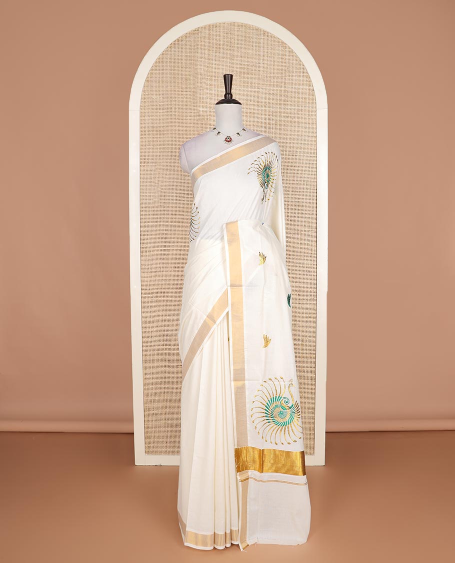 Cream peacock motifs embroidered Kerala cotton saree, bavanji border, and peacock embroidered pallu