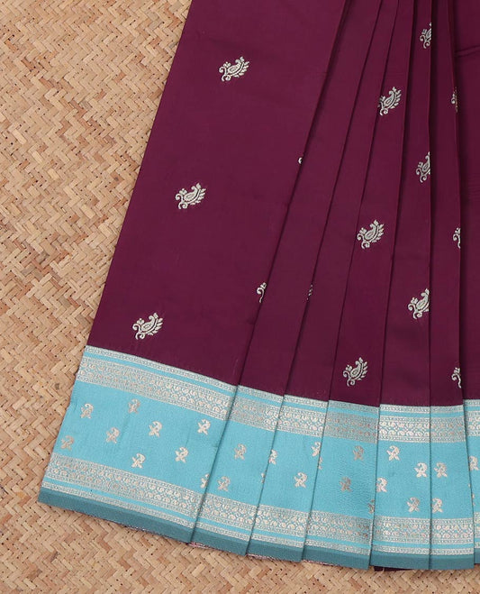 Wine Litchi Saree, Bedecked with Zari Buttas, a Contrast Traditional Zari Border, Grand Pallu, and a Contrast Blouse
