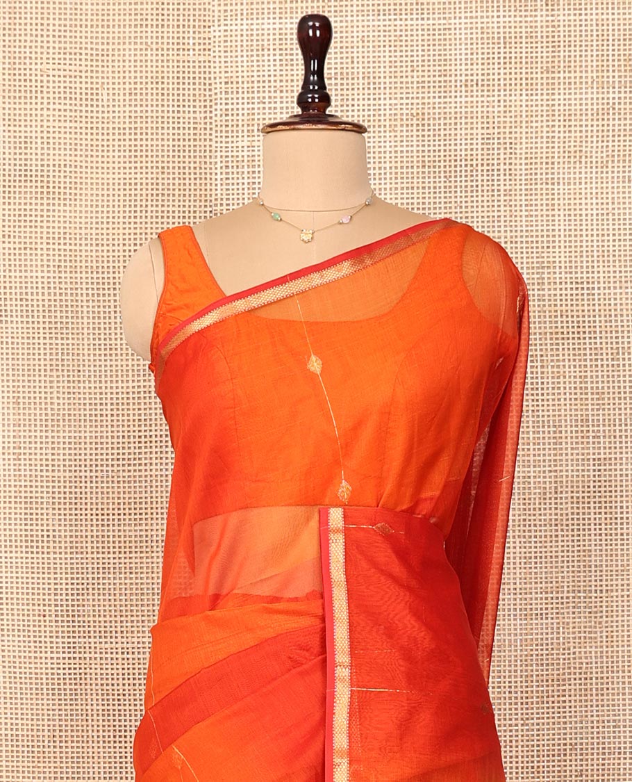 Orange Maheshwari Cotton Saree, Delicately Woven with Diamond Stripes on Its Body, Highlighted by Zari Border of Chevron Designs, Gleaming Pallu Steeped with Zari Stripes, and Paired with a Matching Blouse