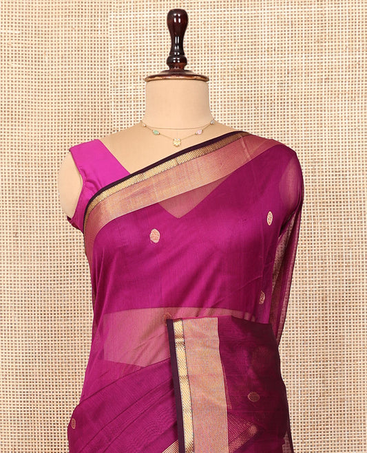 Purple Maheshwari Cotton Saree, Subtly Enriched with Buttas All Over Its Body, Highlighted by Traditional Zari Border, Pallu Steeped with Gleaming Zari Stripes, and Paired with a Matching Blouse