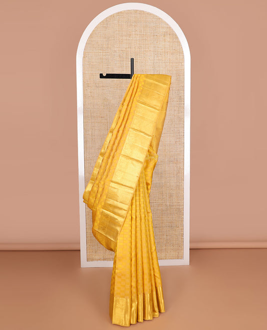 Yellow checkered design silk saree with self border of rekku, banaras, muthu, mayil design & jaal design pallu