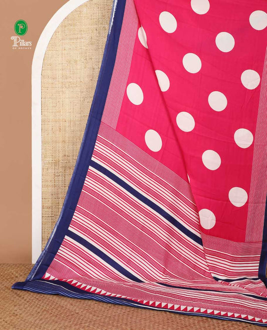 Cream with pink polka dot printed gajji silk saree with contrast piping border & printed pallu along with striped printed blouse
