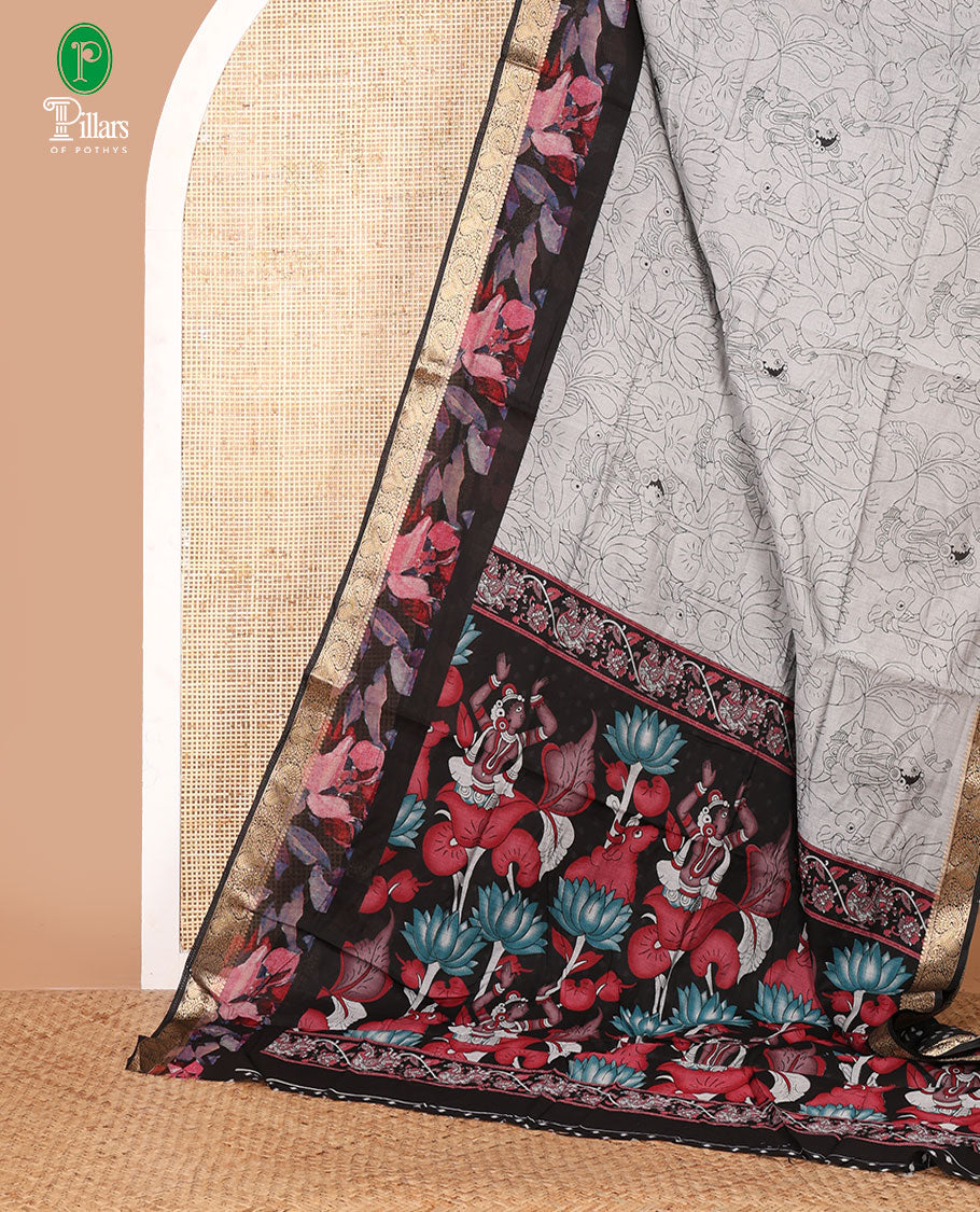 Grey kalamkari-style cow, lotus & human motifs printed Assam cotton saree, contrast floral print & zari paisley border & printed blouse