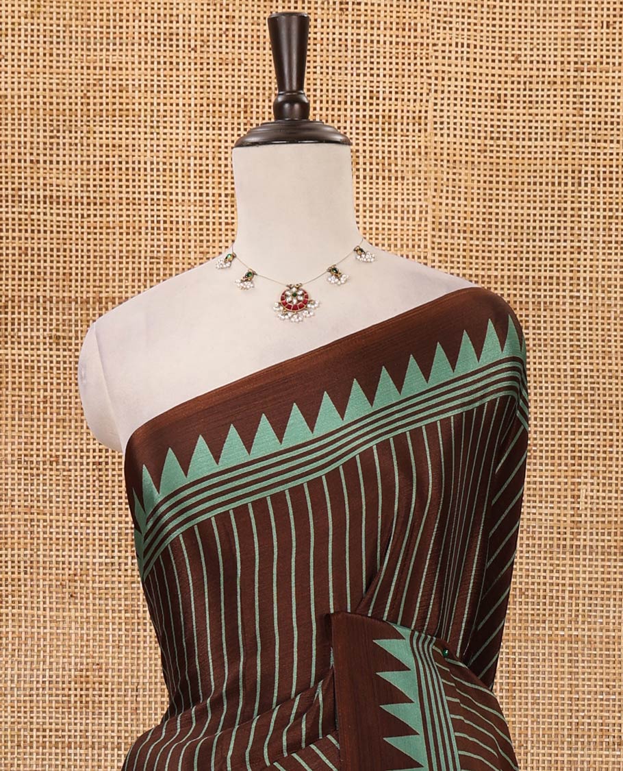 Brown vertical stripes printed Turkey crepe saree, temple printed border, geometric printed pallu & Ajrakh-printed blouse