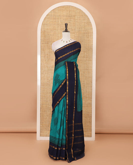 Rama green kolam motifs printed Sungudi cotton saree, contrast rettai pettu rudraksham motif border, striped pallu & contrast zari checked blouse