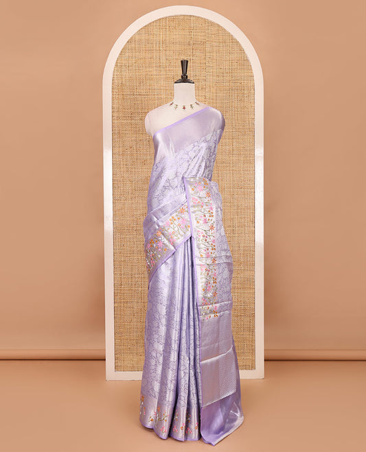 Lavender floral jaal jacquard celebrity tissue saree, zari border of multi-color floral motifs embroidery, jaal pallu & brocade blouse