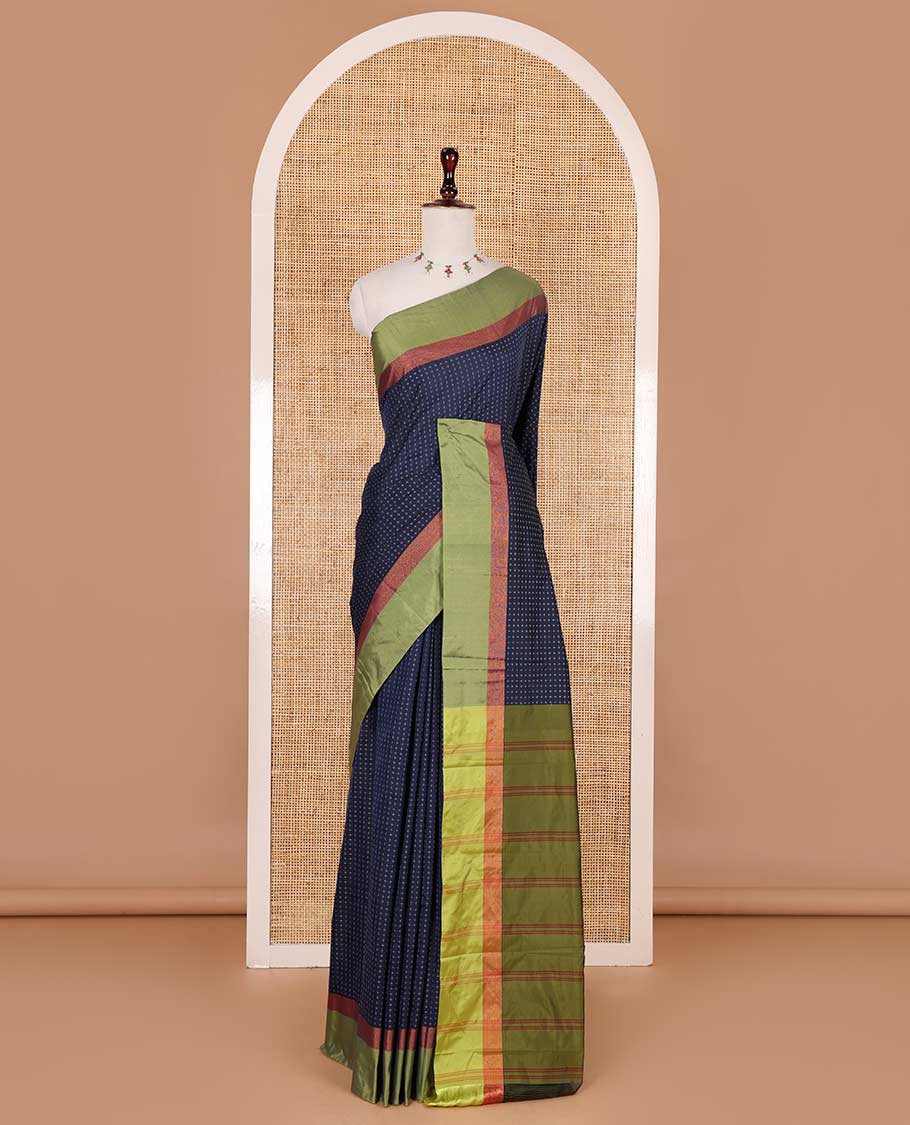 Navy blue-green plus-shaped buttas steeped semi-soft silk saree, contrast satin border of stripes, striped pallu, and contrast blouse