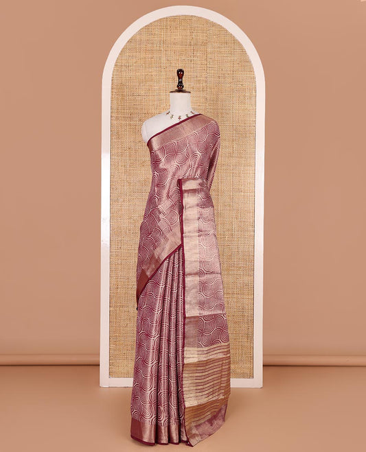 Wine scallop design tissue saree, zari striped border, striped pallu, and gleaming matching blouse