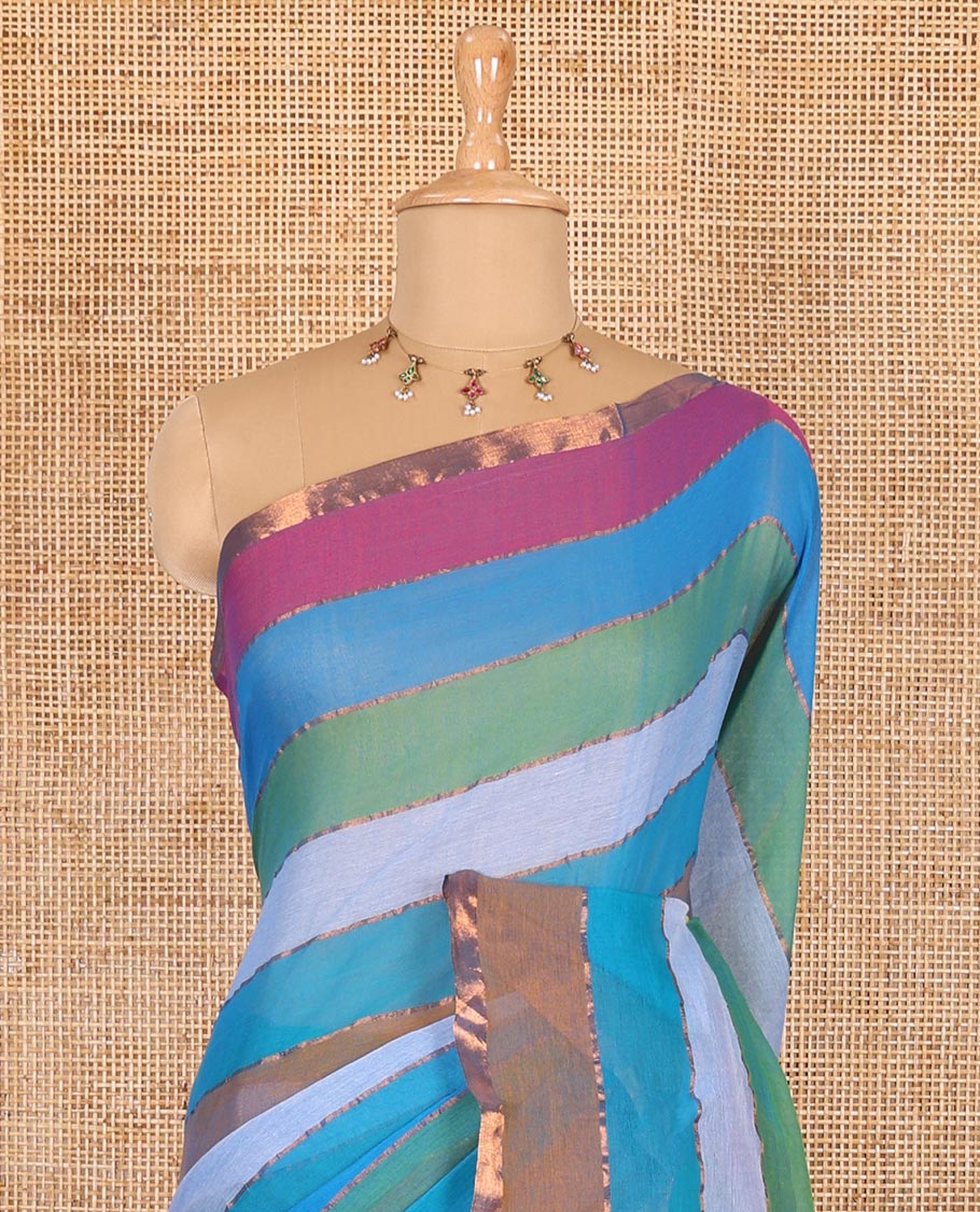 Blue rainbow-style striped Khadi mul cotton saree with piping zari border, and a matching zari striped blouse
