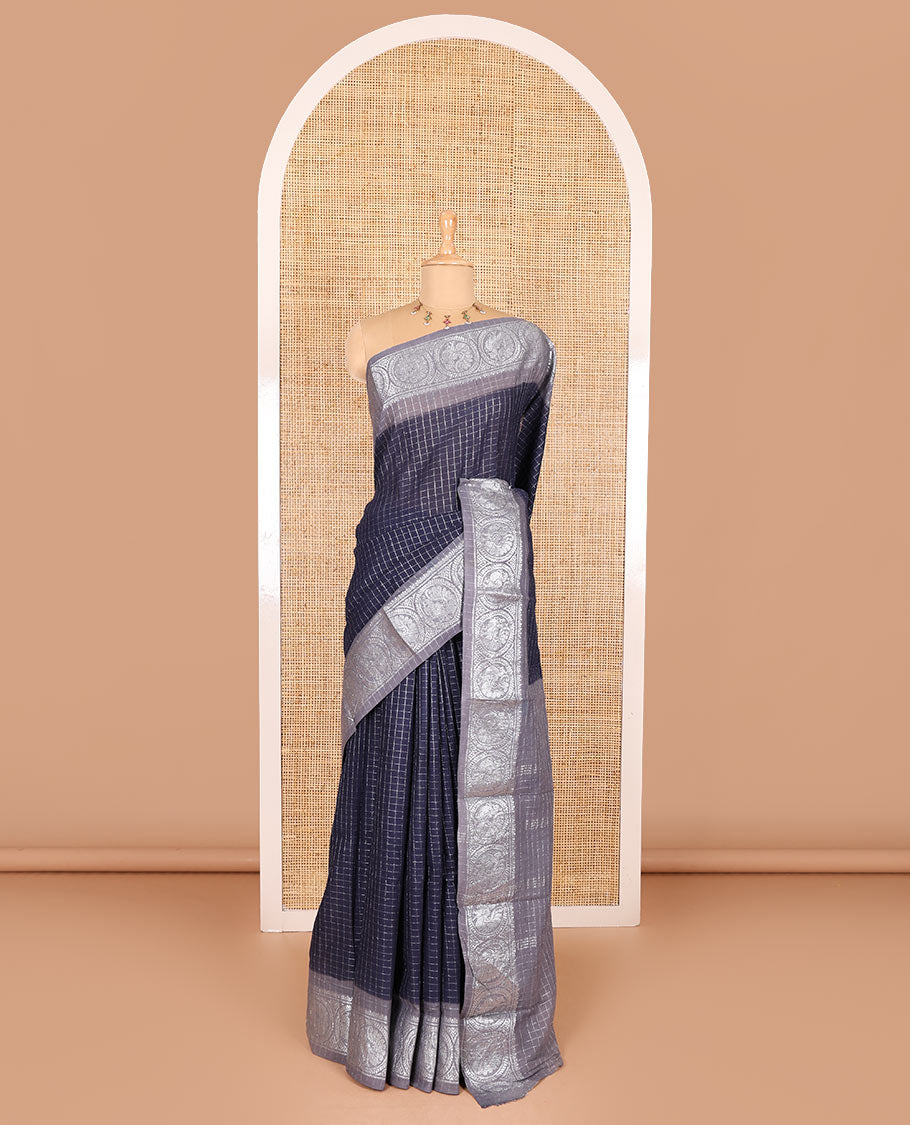 Navy blue and grey checked sungudi cotton saree, contrast silver zari round peacock border, striped pallu, and a contrast checked blouse