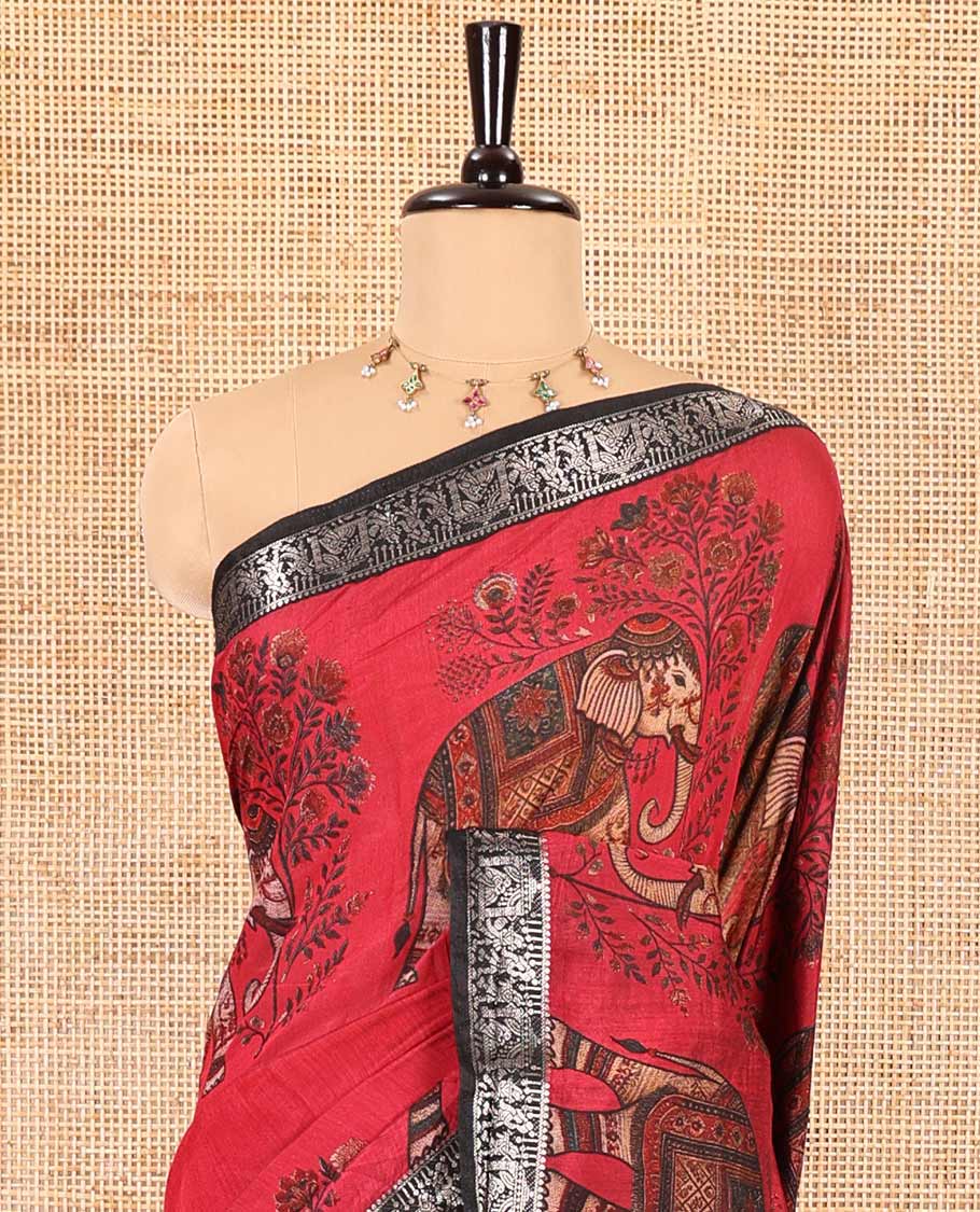 Red plain muslin cotton saree, contrast wedding-theme of floral and elephant motifs print, printed pallu, and a contrast buttas and zari bordered blouse