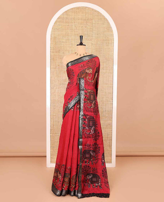 Red plain muslin cotton saree, contrast wedding-theme of floral and elephant motifs print, printed pallu, and a contrast buttas and zari bordered blouse