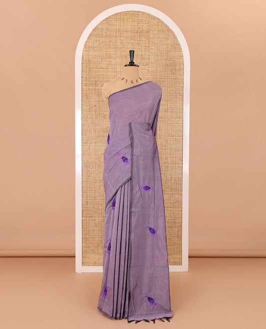 Borderless light lavender thilakam motifs patch embroidered South cotton saree with a plain blouse and a contrast ogee patterns printed blouse