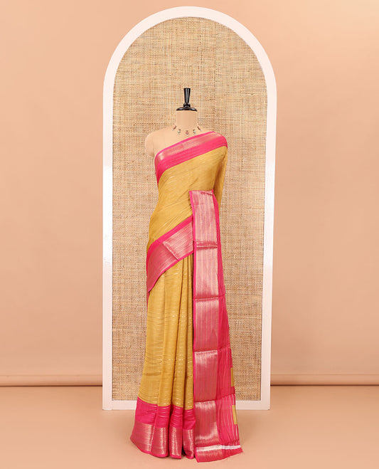 Gold horizontal zari striped moss chiffon saree, contrast traditional zari border, striped pallu, and a contrast zari design blouse