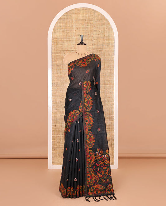 Black lotus motifs thread woven jute cotton, scallop thread woven border, pallu of lotus, peacock and paisley designs along with a plain blouse