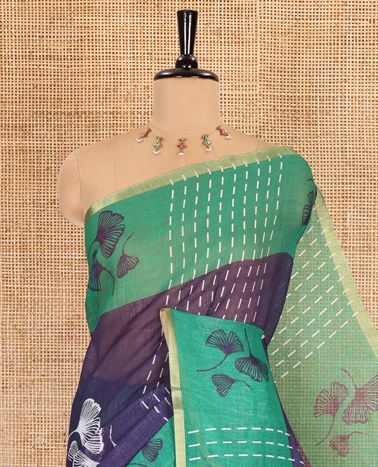 Navy blue vertical striped and floral buttas linen cotton saree, contrast striped and floral printed border, jaal pallu, and a contrast printed blouse