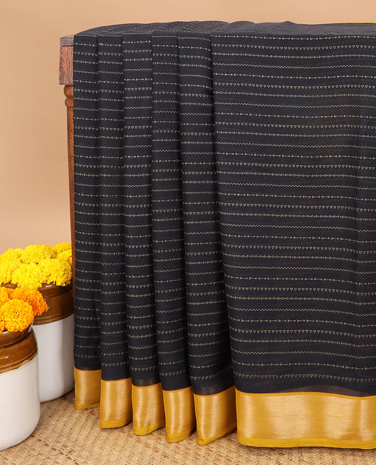Black gold foil printed moss crepe saree with contrast gold zari thread border & printed lining chit pallu along with plain blouse