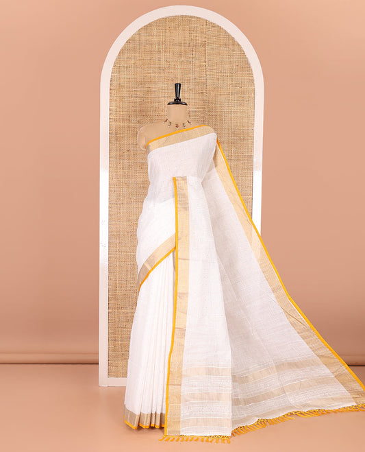 White and yellow sequins striped Linen cotton saree, contrast zari sequins striped border, striped pallu, and a contrast plain blouse