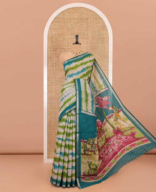 Rama shibori printed muslin cotton saree, contrast zari border, village theme printed pallu, and a contrast dots printed blouse