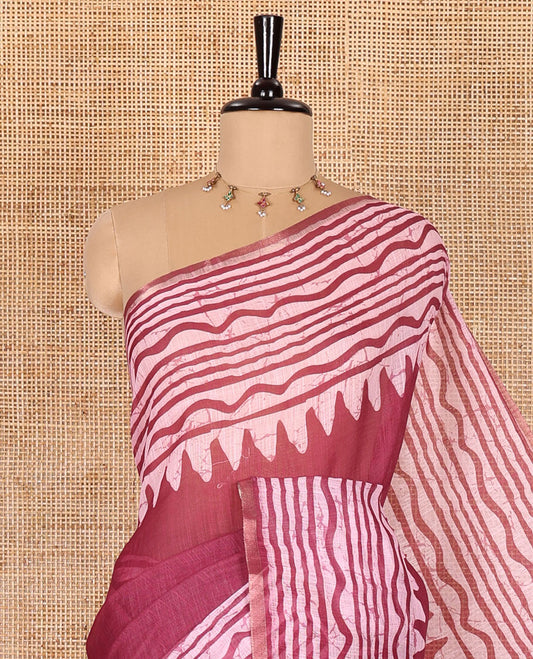 Wine plain linen cotton saree, temple zig-zag striped batik printed border, batik printed pallu, and triangle motifs batik printed blouse