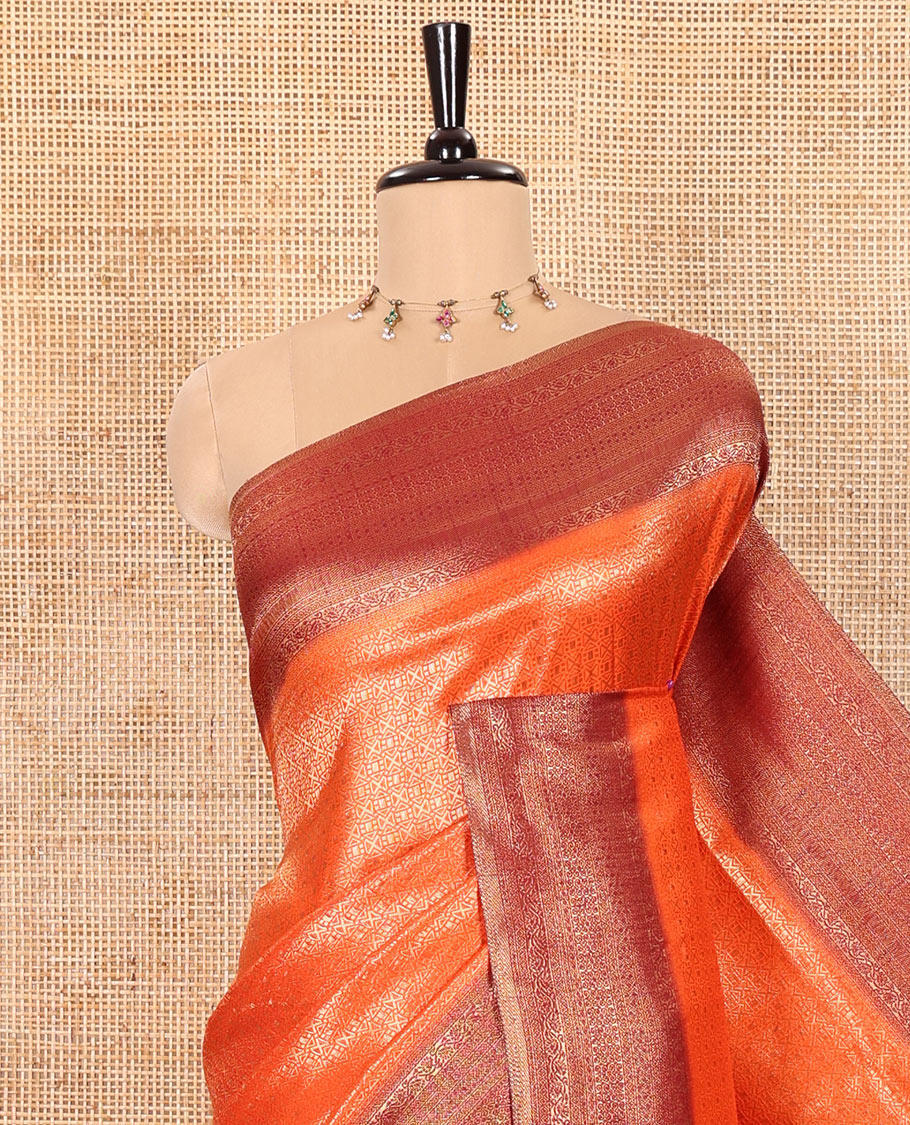 Rust Orange Luxury Soft Silk Saree Featuring Diamond Jacquard Design on Its Body, Highlighted with a Contrast Traditional Zari Border, Pallu Decked Up with Jaal Designs, and Paired with a Contrast Jacquard Blouse