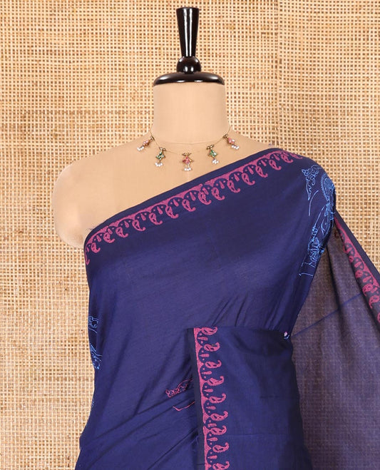 Navy Blue South Cotton Saree Featuring Bharatanatyam Motifs Block Printed All Over Its Body, Subtly Block Printed Border of Paisleys, and Paired with a Contrast Paisleys Block Printed Blouse