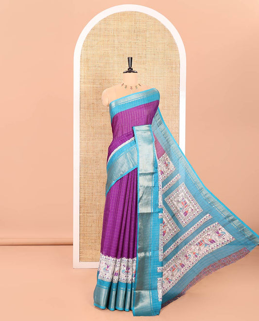 Violet Dola Silk Saree Decorated with Checks and Madhubani Village-Style Prints, Complemented by a Contrast Border of Traditional Zari Designs, Pallu of Madhubani Prints, and Paired with a Contrast Printed Blouse
