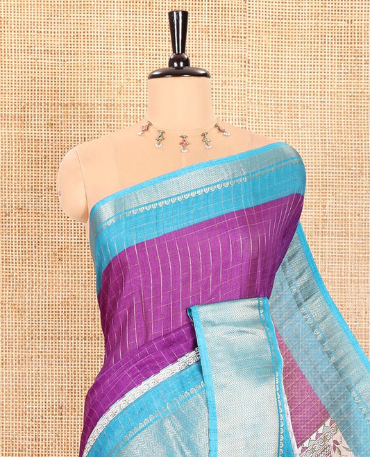 Violet Dola Silk Saree Decorated with Checks and Madhubani Village-Style Prints, Complemented by a Contrast Border of Traditional Zari Designs, Pallu of Madhubani Prints, and Paired with a Contrast Printed Blouse