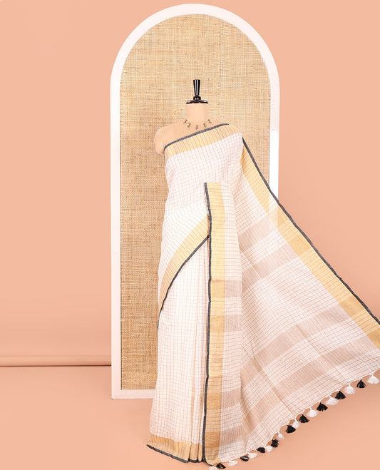 Cream and Black Linen Saree Sparsely Sparkled with Checks, Subtly Designed Zari Border, Zari Striped Pallu, and Paired with a Contrast Blouse