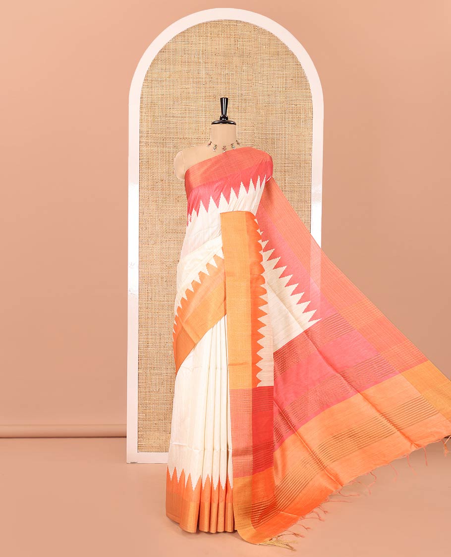 Cream Plain Semi-Jute Tussar Saree, Complemented by a Contrast Pink-Orange Ganga-Jamuna Temple Border, Sparsely Striped Pallu, and Paired with a Contrast Blouse