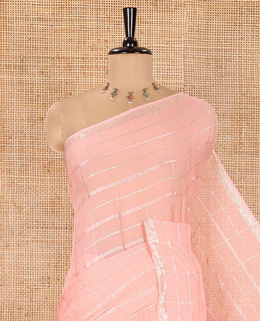 Peach Chinon Chiffon Saree, Richly Detailed with Gold Zari Checked Design on Its Body, Self-Pallu, and Paired with a Contrast Elephant-Tree-Themed French Knot Embroidered Blouse