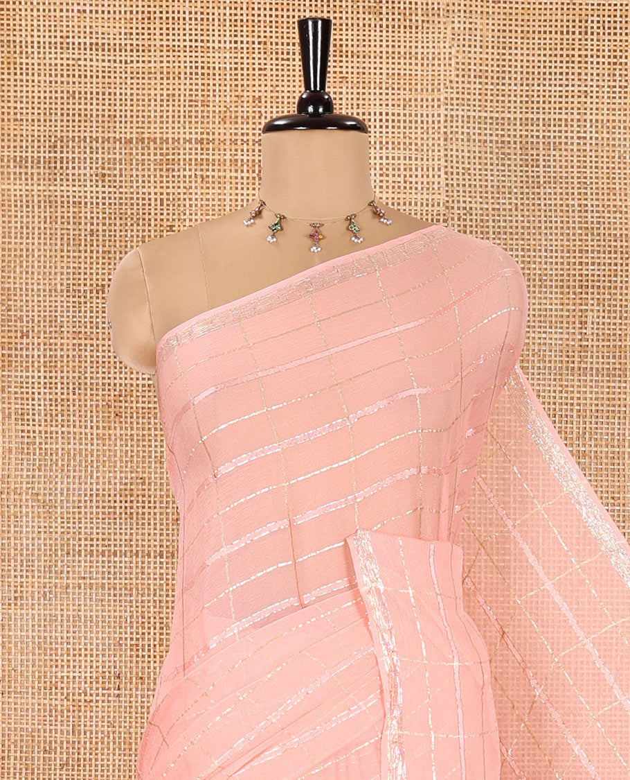 Peach Chinon Chiffon Saree, Richly Detailed with Gold Zari Checked Design on Its Body, Self-Pallu, and Paired with a Contrast Elephant-Tree-Themed French Knot Embroidered Blouse