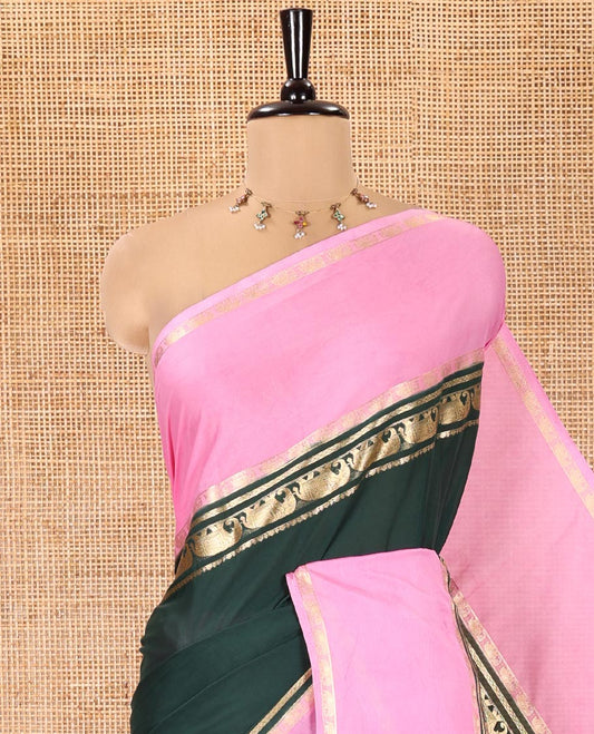 Bottle Green Plain Art Mysore Silk Saree, Complemented by Captivating Contrast Rettai Pettu Traditional Border of Elephant Zari Buttas, Striped Pallu, and Paired with a Contrast Blouse