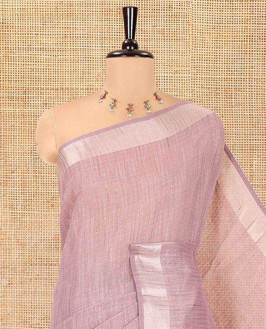 Lavender Linen Zari Cotton Saree, Gleamed Up with Zari Stripes All Over Its Body, a Subtle Zari Border, a Self-Pallu, and Comes Without a Blouse