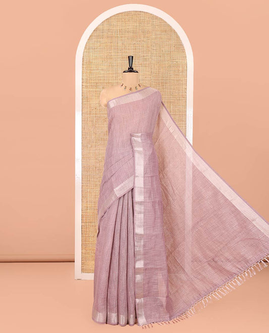 Lavender Linen Zari Cotton Saree, Gleamed Up with Zari Stripes All Over Its Body, a Subtle Zari Border, a Self-Pallu, and Comes Without a Blouse