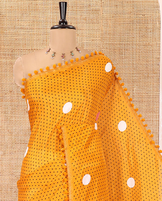 Mustard Chanderi Cotton Saree, Steeped with Small and Big Polka Dots on Its Body, Subtle Pom-Pom Tasseled Border, a Self-Pallu, and Paired with a Contrast Blouse