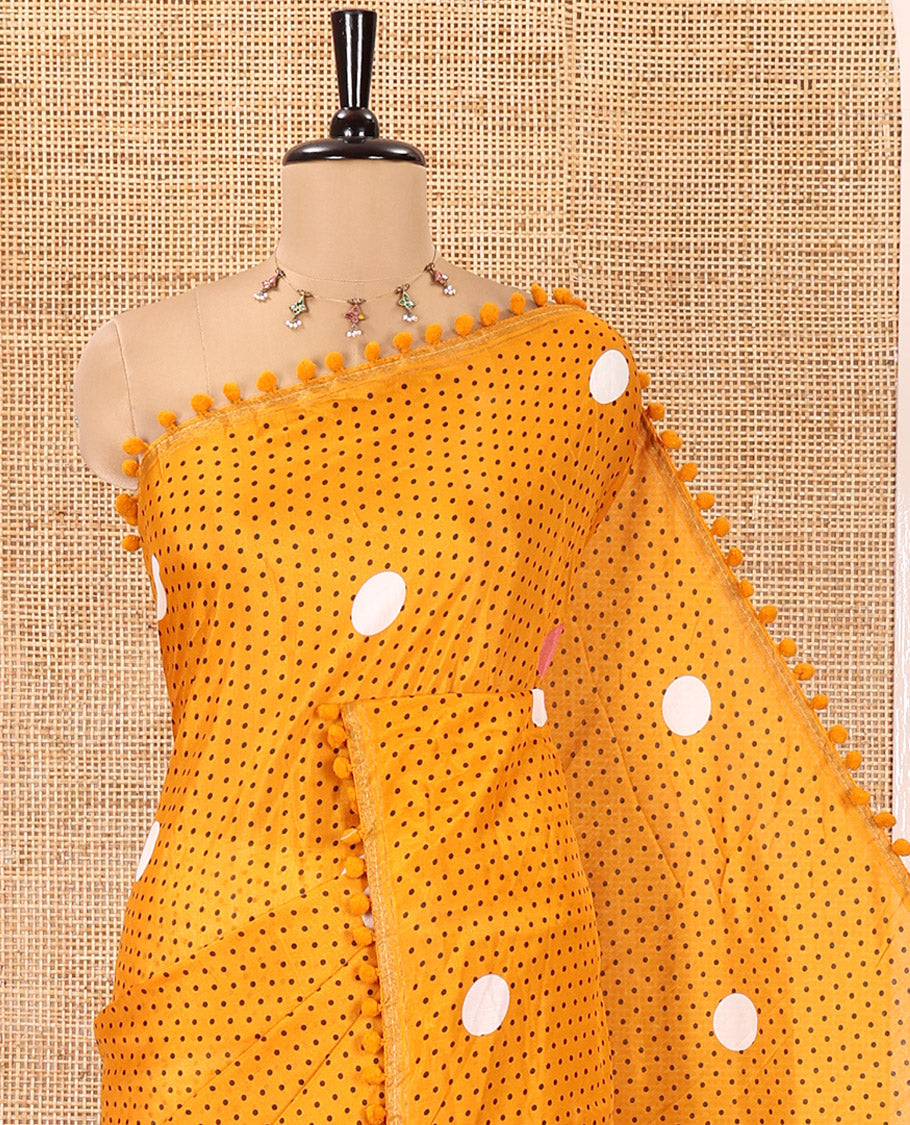 Mustard Chanderi Cotton Saree, Steeped with Small and Big Polka Dots on Its Body, Subtle Pom-Pom Tasseled Border, a Self-Pallu, and Paired with a Contrast Blouse