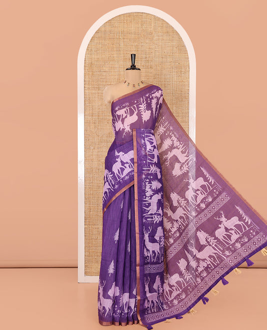 Violet Christmas-Themed Linen Cotton Saree, Accentuated with Christmas Tree Motifs Printed on Its Body, a Subtle Piping Border, Pallu of Christmas-Themed Print, and Paired with a Contrast Floral Printed Blouse