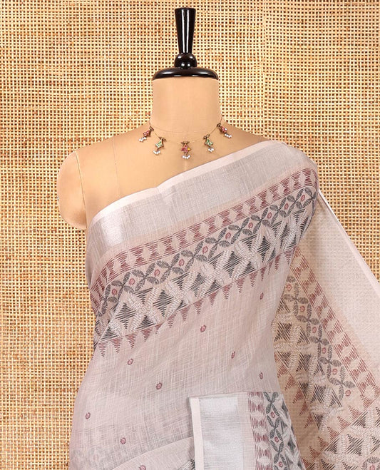 Chikku Linen Saree, Decorated with Buttas and Geometric Print on Its Body, Highlighted by Zari Bavanji Border, Pallu of Same Geometric Print, and Paired with a Contrast Blouse