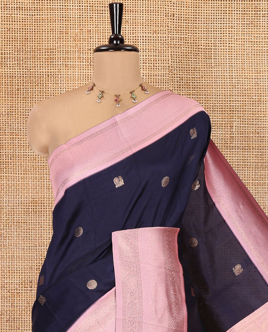 Navy Blue Kanchi Silk Saree Features Mayil-Chakram Buttas, a Contrast Traditional Border, Jaal Pallu, and a Contrast Blouse