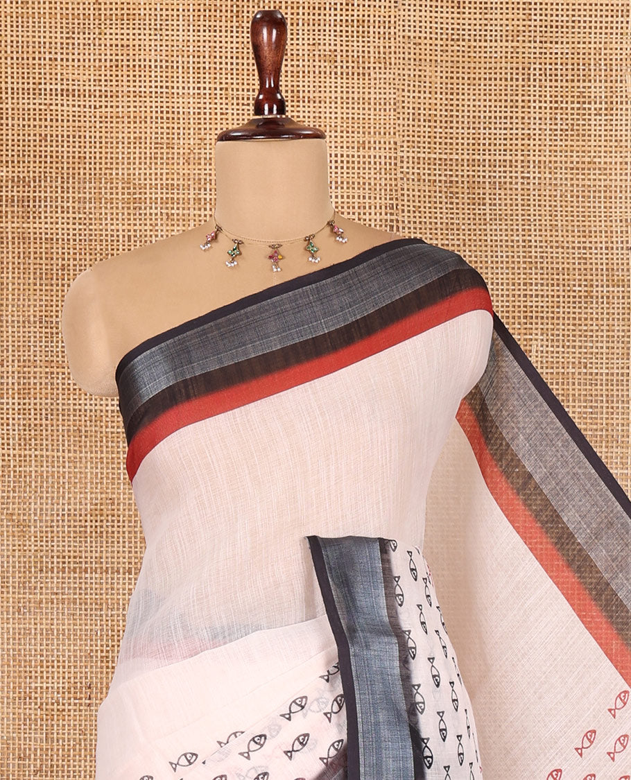 Cream Linen Cotton Saree Artfully Printed with Fish Motifs, a Contrast Border, a Fish-Printed Pallu, and a Contrast Blouse