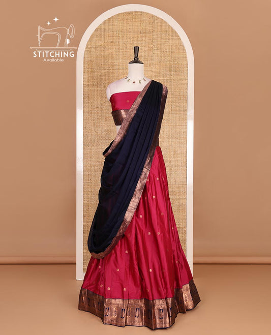 Pink taffeta silk half saree, zari buttas with contrast blue traditional zari border, matching zari blouse, and contrast plain zari border dhavani
