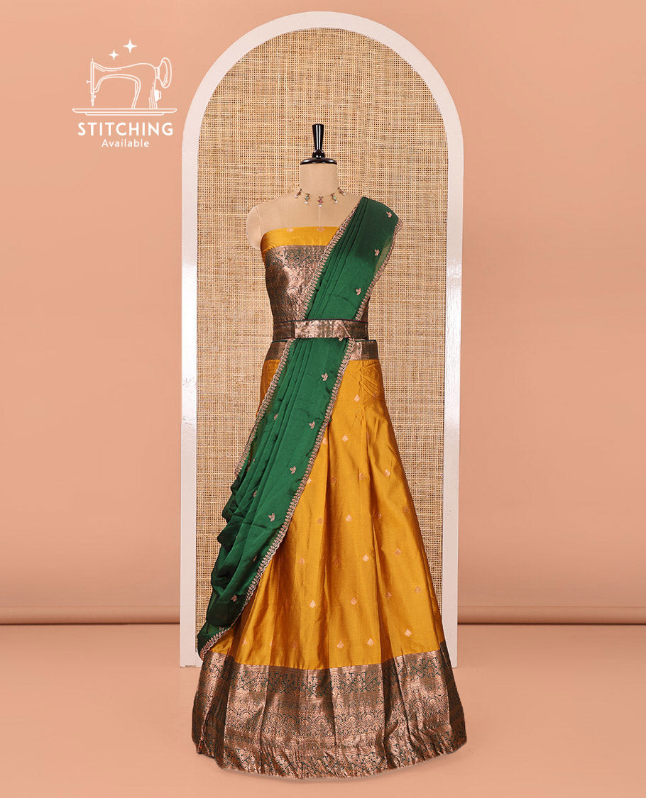 Yellow and Green Semi-Banarasi Half-Saree Adorned with Zari Buttas on Its Skirt, Complemented by a Contrast Mughal-Style Intricate Zari Design Border, Paired with a Matching Blouse, and a Satin Georgette Embroidered Scallop Dhavani
