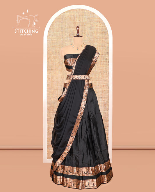 Black Semi-Silk Half-Saree Features Plain Skirt, a Rettai Pettu Elephant-Peacock Border, Matching Blouse, and a Dhavani
